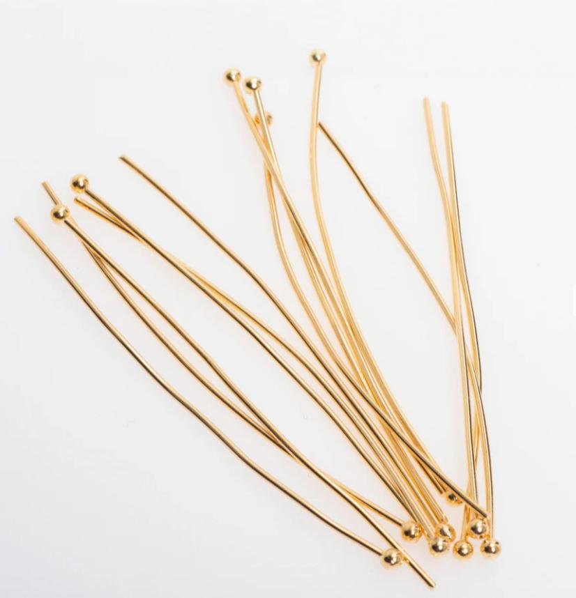 Assorted headpins and eyepins for jewelry making in various lengths and finishes