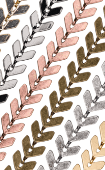 A selection of Herringbone Chains in various finishes, perfect for creating sleek and luxurious jewelry.