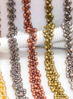 A selection of Popcorn Chains in various finishes, perfect for creating elegant and textured jewelry.