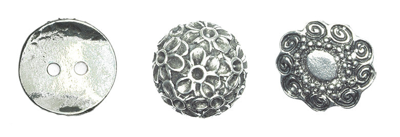 Assortment of jewelry buttons and embellishments in various styles and materials